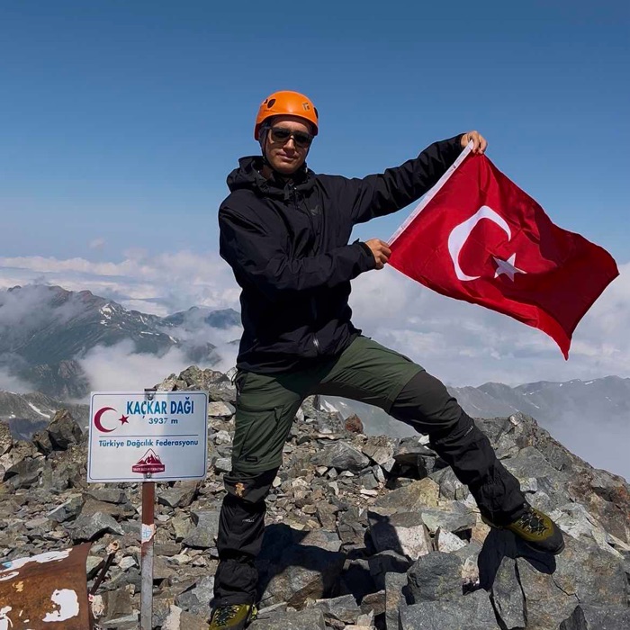 Orhan E.